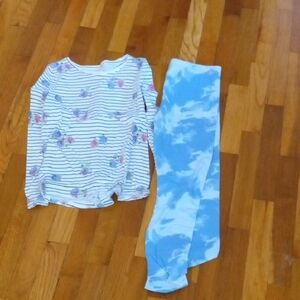 girl large light blue leggings and long sleeve top
